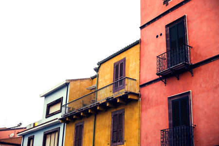 windows of colorful house in Bosa. Italy.の写真素材