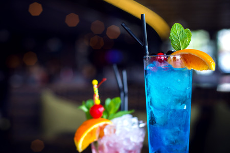 Refreshing cocktail with orange, berries and mint.の写真素材