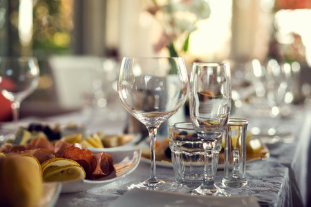 Close up picture of empty glasses in restaurant.の写真素材