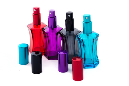 Different perfume bottles isolated on the white background.の写真素材
