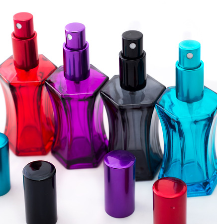 Different perfume bottles isolated on the white background.の写真素材