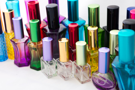 Different perfume bottles isolated on the white background.の写真素材