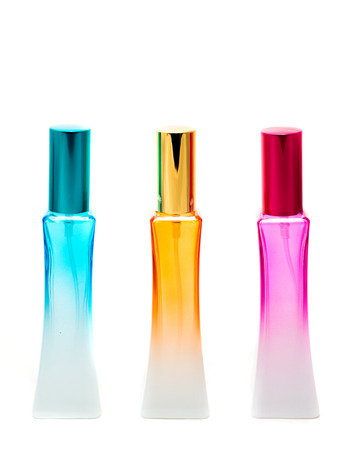 Different perfume bottles isolated on the white background.の写真素材