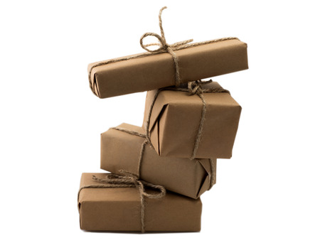 Stack of handcraft gift boxes on white background.の写真素材