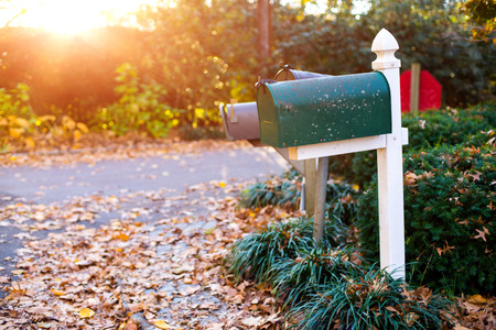 Mail Box in the autumn village. Sunset.の写真素材