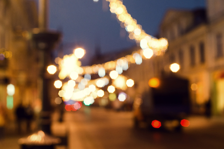 Lights out of focus, lens blur. Christmas time in Europeの写真素材