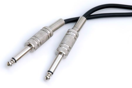 Black Audio Cables on an Isolated White Backgroundの写真素材