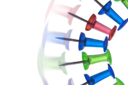 Pins on a curved line, red, blue, greenの写真素材