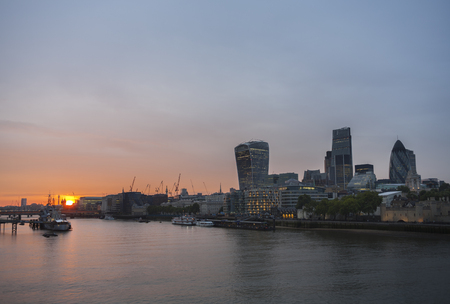 Sunset with yellow sky, City of Londonの写真素材