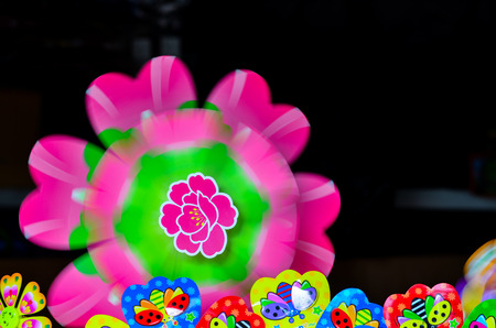 Rotating pinwheel, bright colorsの写真素材