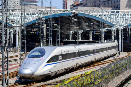 Beijing,China-2016:A Hexiehao bullet train is entering the station
