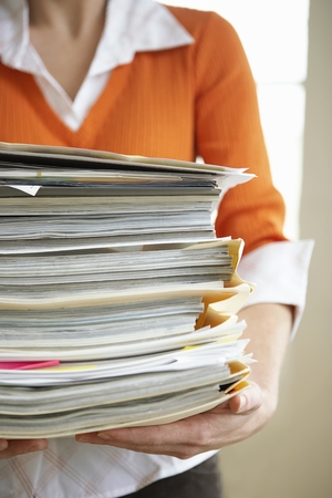 Accountant holds documentsの写真素材