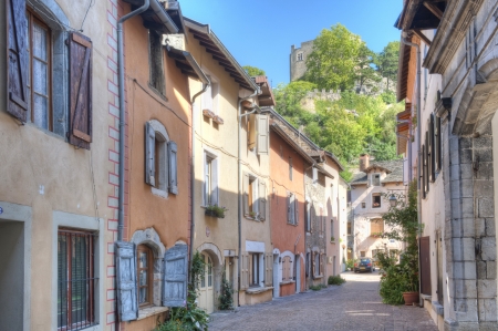 Saint Laurent Hill above a street in Cremieu の写真素材