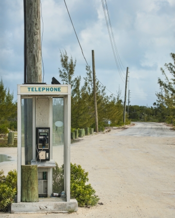 telephone booth at end of road on Cat Islandのeditorial素材
