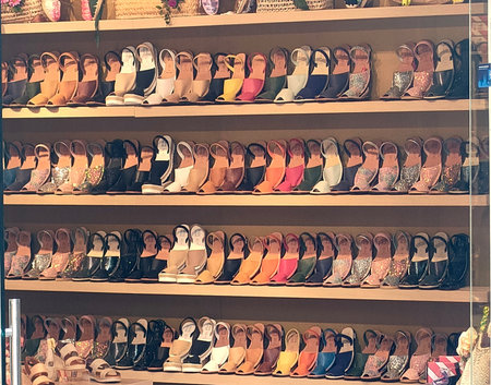 Shoes on a shelf in a shoe store, retro tonedの写真素材