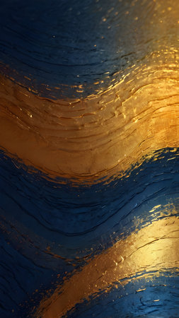 abstract background of blue and gold oil paint with some smooth linesの素材