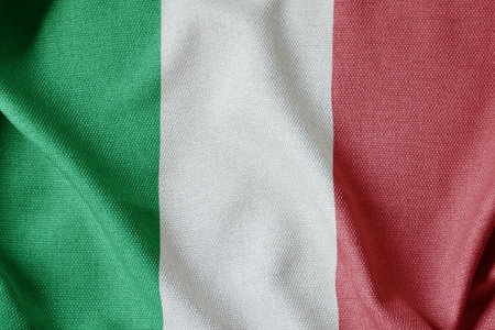 Flag of Italy on the wavy surface of fabric, fabric textureの写真素材
