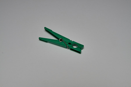 Clothes peg sign. Dark green icon on transparent background.の写真素材