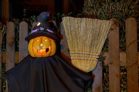 shining halloween pumpkin witch in the nightの写真素材