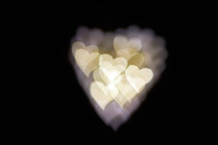 love and valentine heart symbol bokeh photographed, ideal as a background image.の写真素材