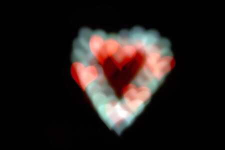 love and valentine heart symbol bokeh photographed, ideal as a background image.の写真素材