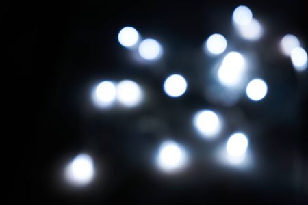 the glitter bokeh lights bokeh defocused background.