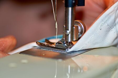 Needle plate, foot and transporter of a sewing machine.の写真素材