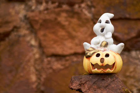 a Shiny halloween pumpkins made of ceramicの写真素材