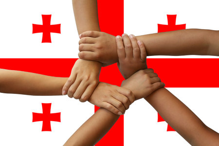 Flag of Georgia, intergration of a multicultural group of young peopleの写真素材