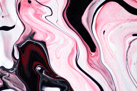 Marbled acrylic colored pattern in the colors red, black, white and pink