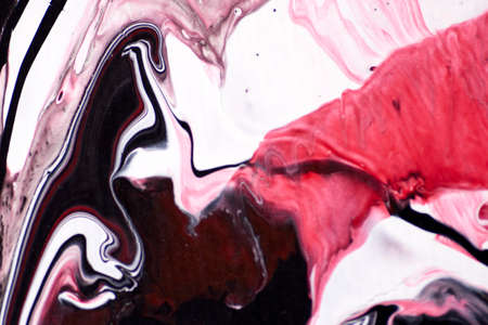 Macro shot of acrylic paint and oil mixture.