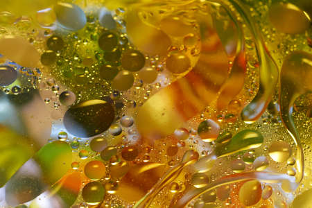 floating in the water abstract colorful oil dropsの写真素材