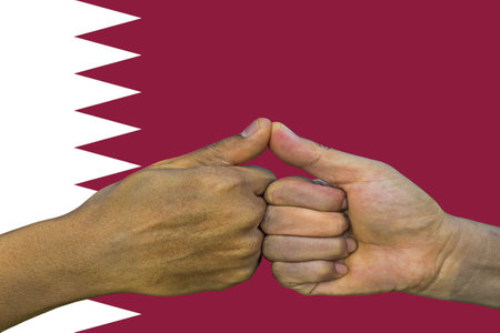 Flag of Qatar, integration of a multicultural group of young people.の写真素材