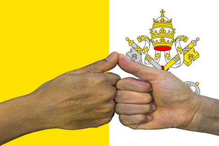 vatican city flag, integration of a multicultural group of young people.の写真素材