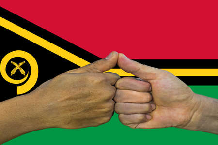 vanuatu flag, integration of a multicultural group of young people.の写真素材