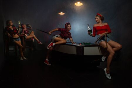 Pin up girls  having fun in nightclub