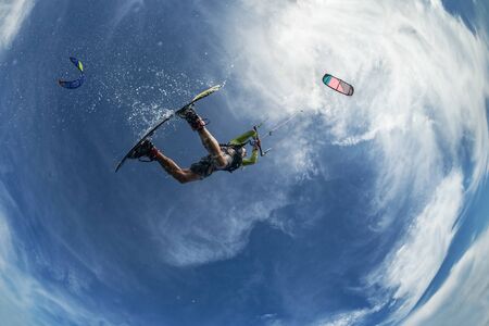 Kite surfer on the wavesの写真素材