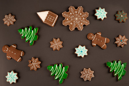 Ginger cookies seamless pattern on brown backgroundの写真素材
