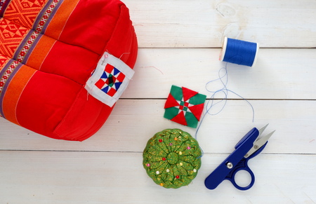 Sewing tool for Embroiled and decorative pillow ,colorful handicraft on white wooden backgroundの写真素材