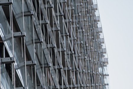 Gray metal and glass facade of an office buildingの写真素材