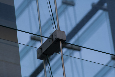 Gray metal and glass facade of an office buildingの写真素材