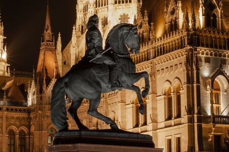 The statue of Francis II Rakoczi in front of the Parliament building in Budapest, Hungaryの写真素材