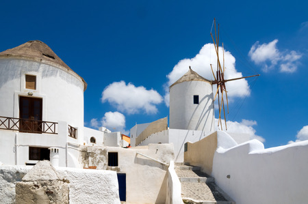 The iconic windmills on the Greek Island of Santoriniの写真素材