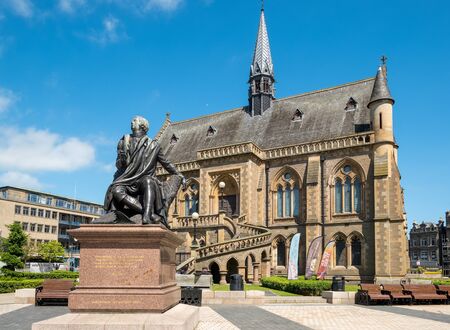 DUNDEE, SCOTLAND, - JUNE, 26, 2019:  The Statue of Robert Burns outside the McManus Art Gallery Museum, Dundee, Scotland.のeditorial素材