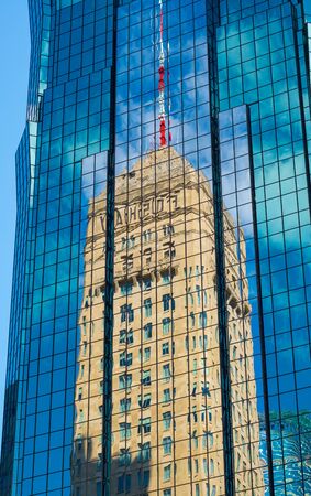 MINNEAPOLIS, USA, - AUGUST, 8, 2019: A refllection of the distinctive Foshay Building  in Minnaepolis, USA.のeditorial素材
