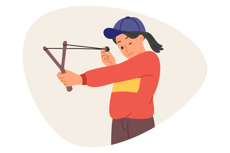 Little mischievous girl shoots with slingshot, closing one eye to aim at target during weekend. Child misbehaves by shooting at peers or glass with homemade slingshot with stretched rubber band.のイラスト素材
