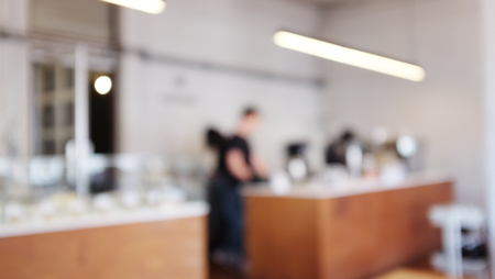 Blurred background image of coffee shopblur group of people working at co-working space, casual style, , business, education concept.Blur library backgroundの写真素材