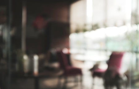 abstract Blur Interior of  Vintage restaurant and cafe. Vintage design in loft style, big cozy hall with tables and private cabins, copy spaceの写真素材