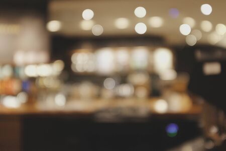 Blurred background of Cafe with abstract bokeh light.の写真素材