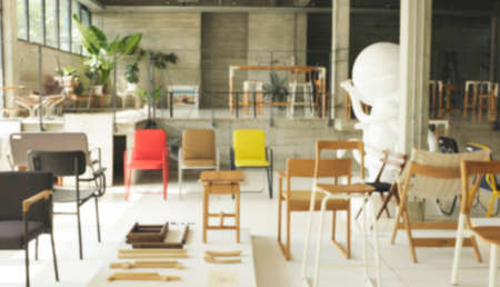 Empty cafe or cafe interior, daytime.lots of different chairs in the interior of an empty cafe